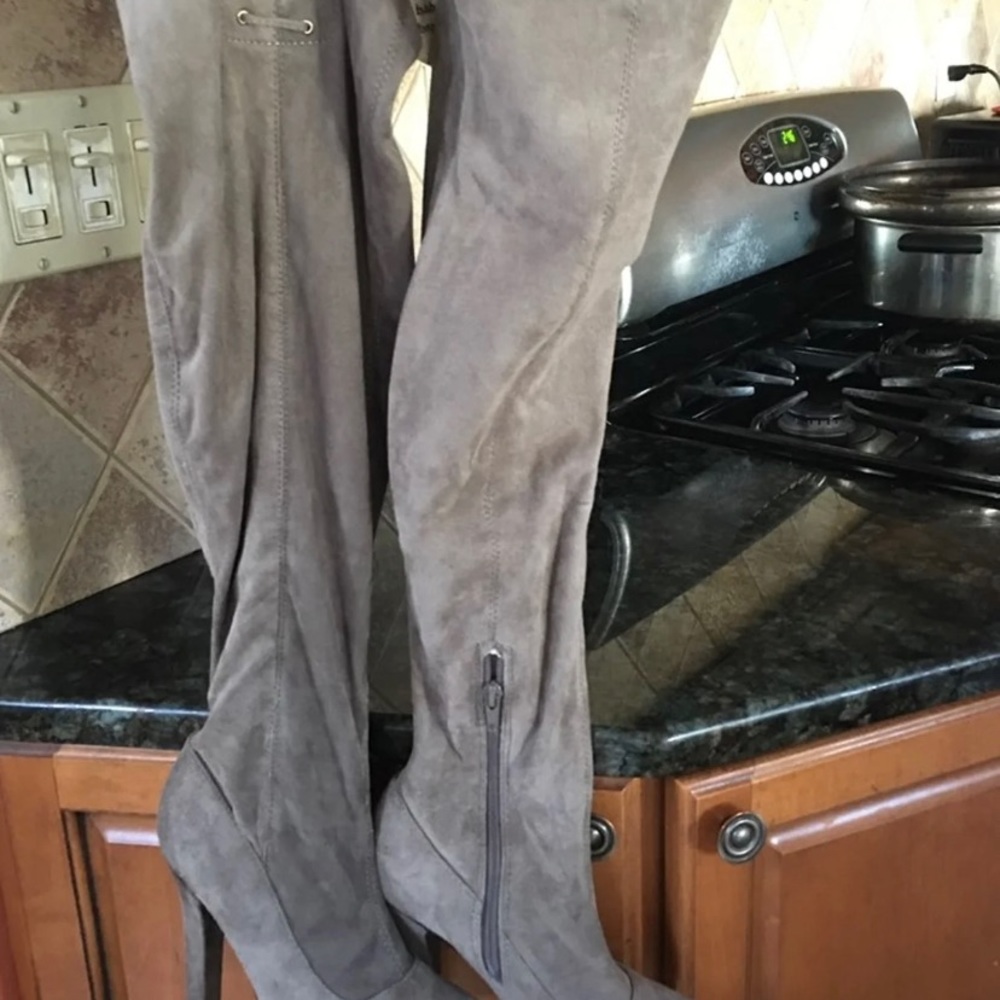 Grey high heeled boots